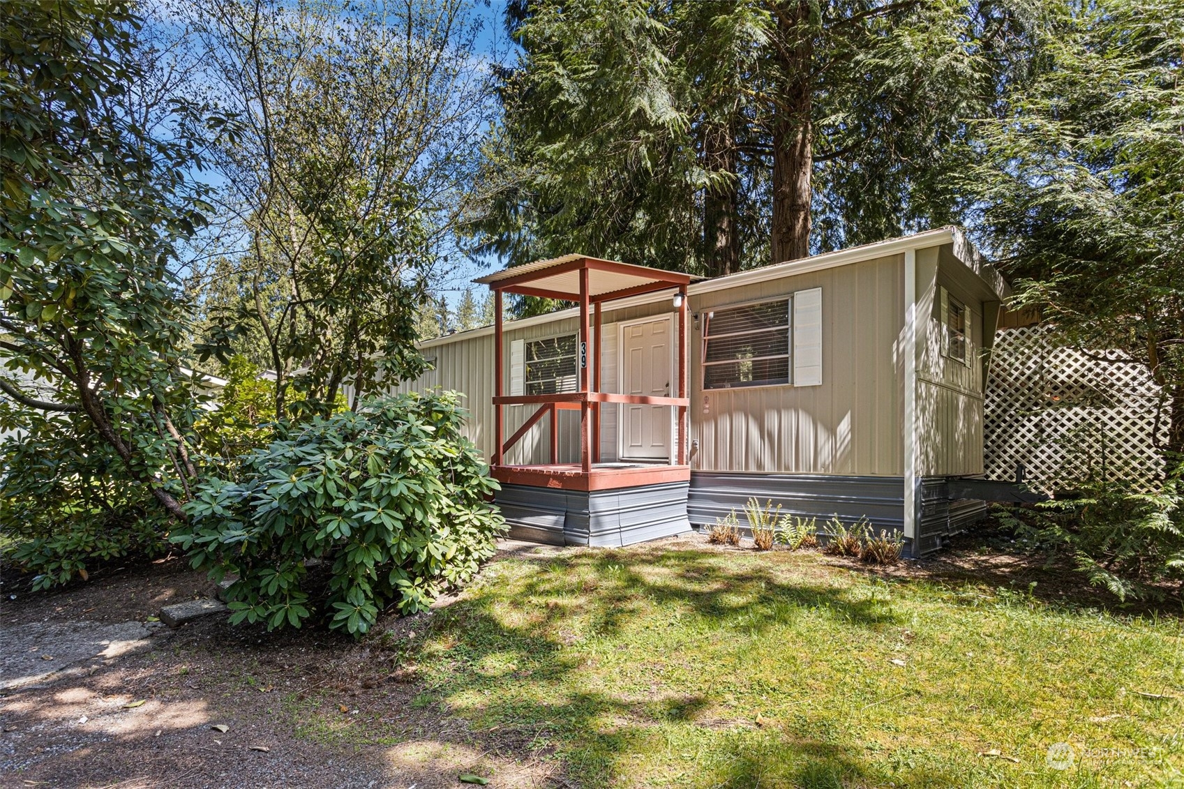 front view of a house with a yard
