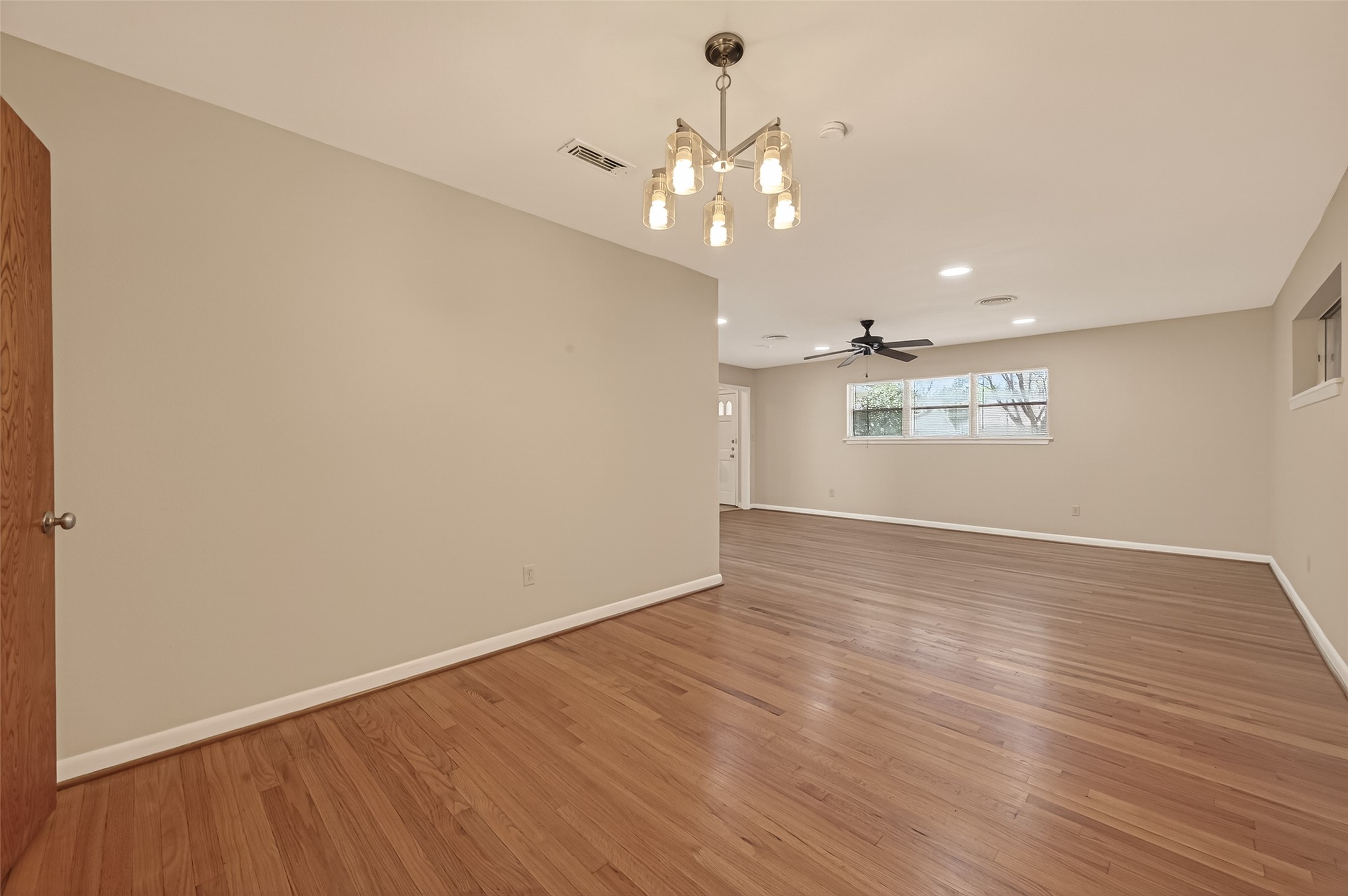 5646 Hazen Street Houston, TX 77081 - Photo 10 of 43 All aspects of this home have been redone, including a fresh coat of paint, stylish overhead and recessed lighting, and new ceiling fans.