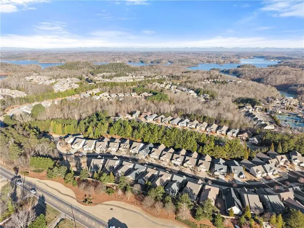 a view of yard with swimming pool and green space