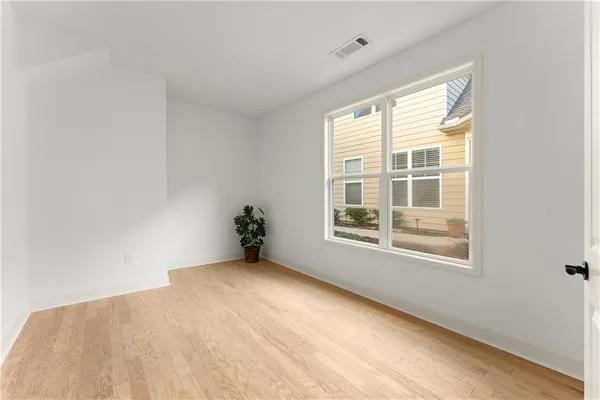 a bathroom with a double vanity sink and mirror