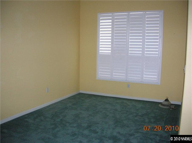 1340 Sterling Crest Lane Reno, NV 89521 - Photo 4 of 9 a view of an empty room with a window