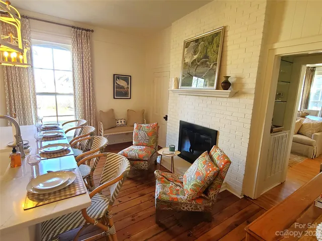 a kitchen with a sink appliances and cabinets