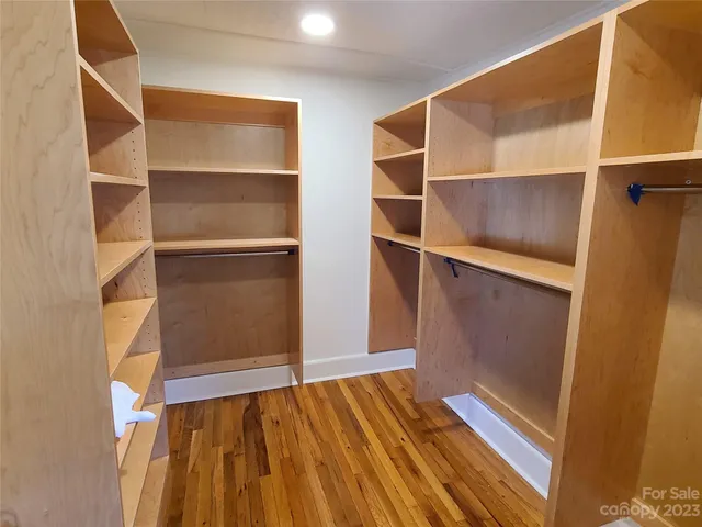 a bathroom with a sink a toilet a shower and a mirror