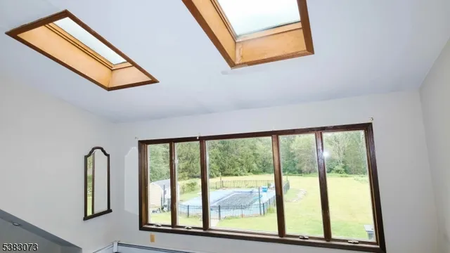 a dining room with a table and chairs