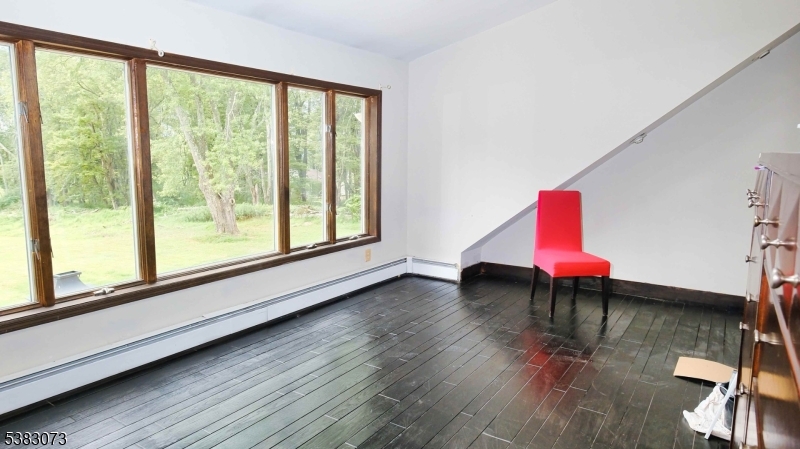 8 Ayers Road Montague, NJ 07827 - Photo 17 of 46 a view of a room with wooden floor and windows