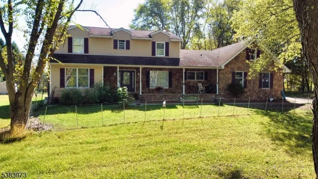 a view of chair and tables in balcony