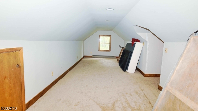 8 Ayers Road Montague, NJ 07827 - Photo 21 of 46 a view of a hallway with a white cabinet and a window