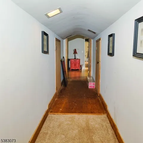 a view of living room with furniture and flat screen tv