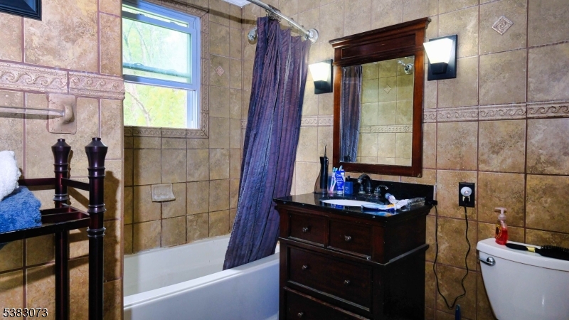 8 Ayers Road Montague, NJ 07827 - Photo 24 of 46 a bathroom with a bathtub and a sink