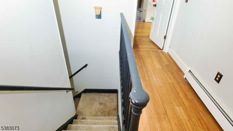8 Ayers Road Montague, NJ 07827 - Photo 25 of 46 a view of a hallway with wooden floor and stairs