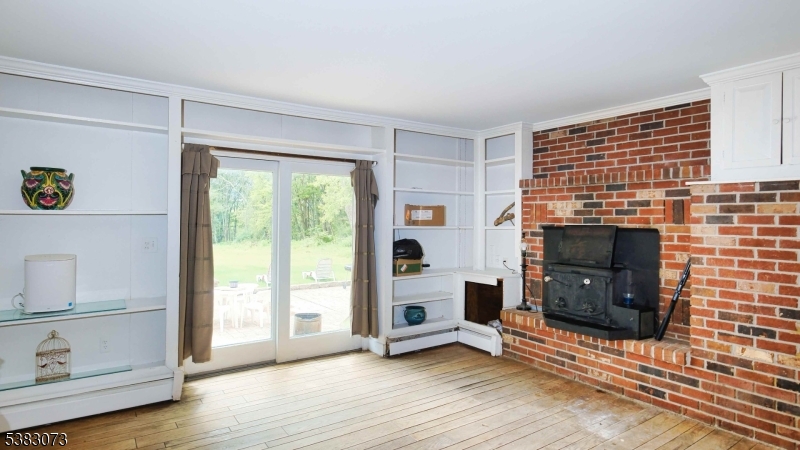8 Ayers Road Montague, NJ 07827 - Photo 34 of 46 a view of an empty room with a window and fireplace