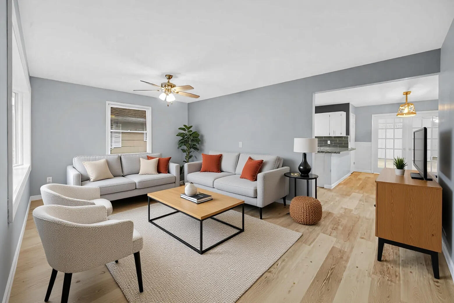 212 Timrick Drive Munster, IN 46321 - Photo 21 of 46 a living room with furniture and a chandelier
