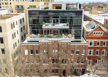 a front view of a building with glass windows