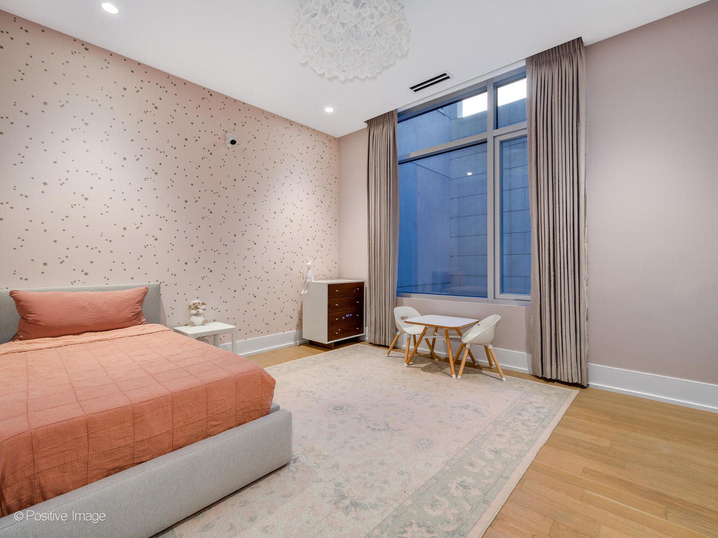 2035 North Orleans Street, Unit 2N Chicago, IL 60614 - Photo 24 of 28 a bedroom with a bed and a table