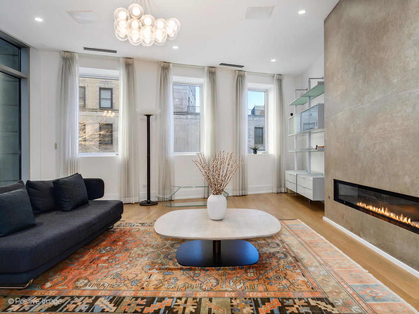 2035 North Orleans Street, Unit 2N Chicago, IL 60614 - Photo 3 of 28 a living room with furniture and a chandelier