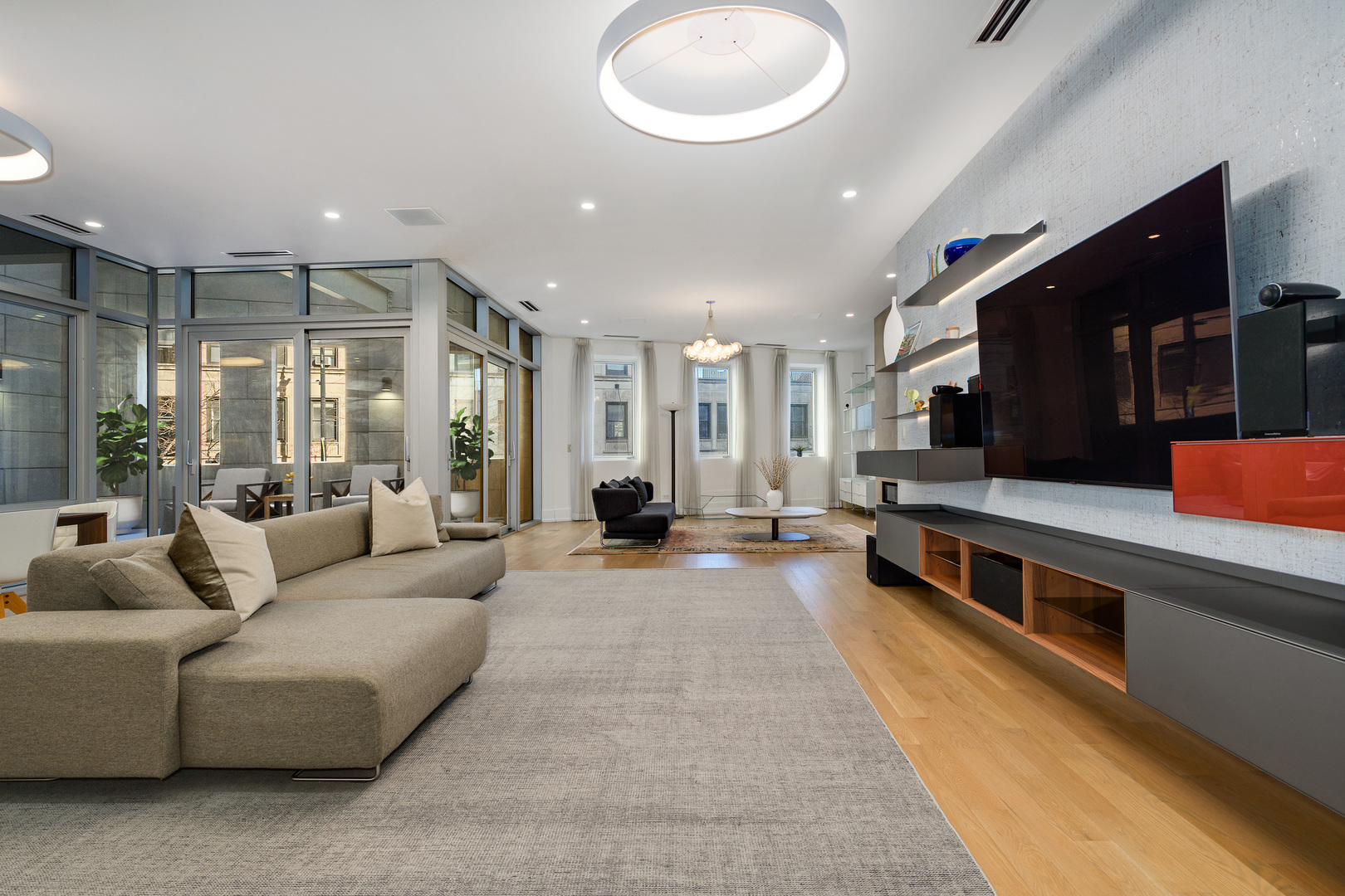 2035 North Orleans Street, Unit 2N Chicago, IL 60614 - Photo 8 of 28 a living room with stainless steel appliances furniture a rug and a view