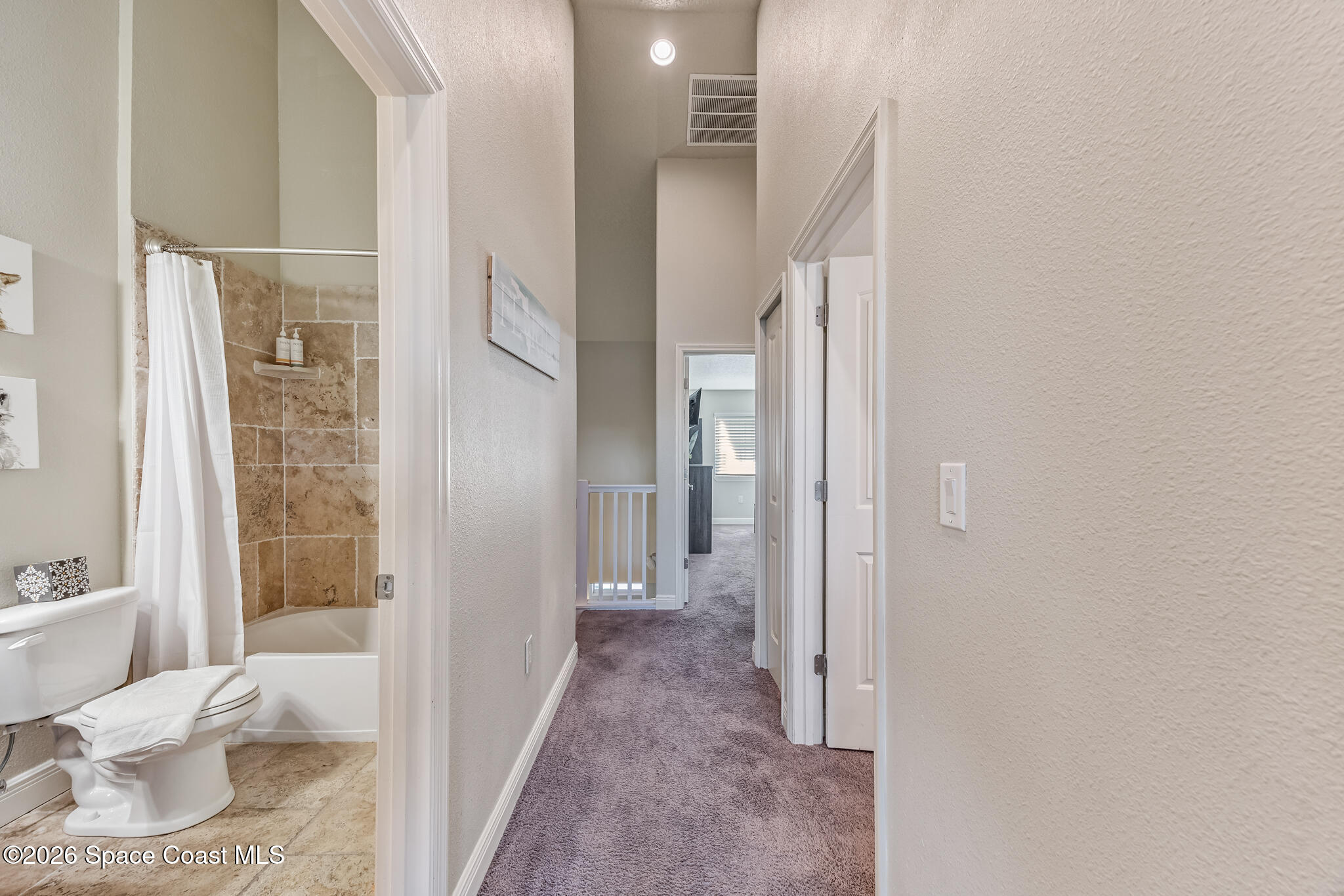 2709 Cutlass Point Lane, Unit 102 Merritt Island, FL 32953 - Photo 15 of 37 a bathroom with a toilet tub and shower