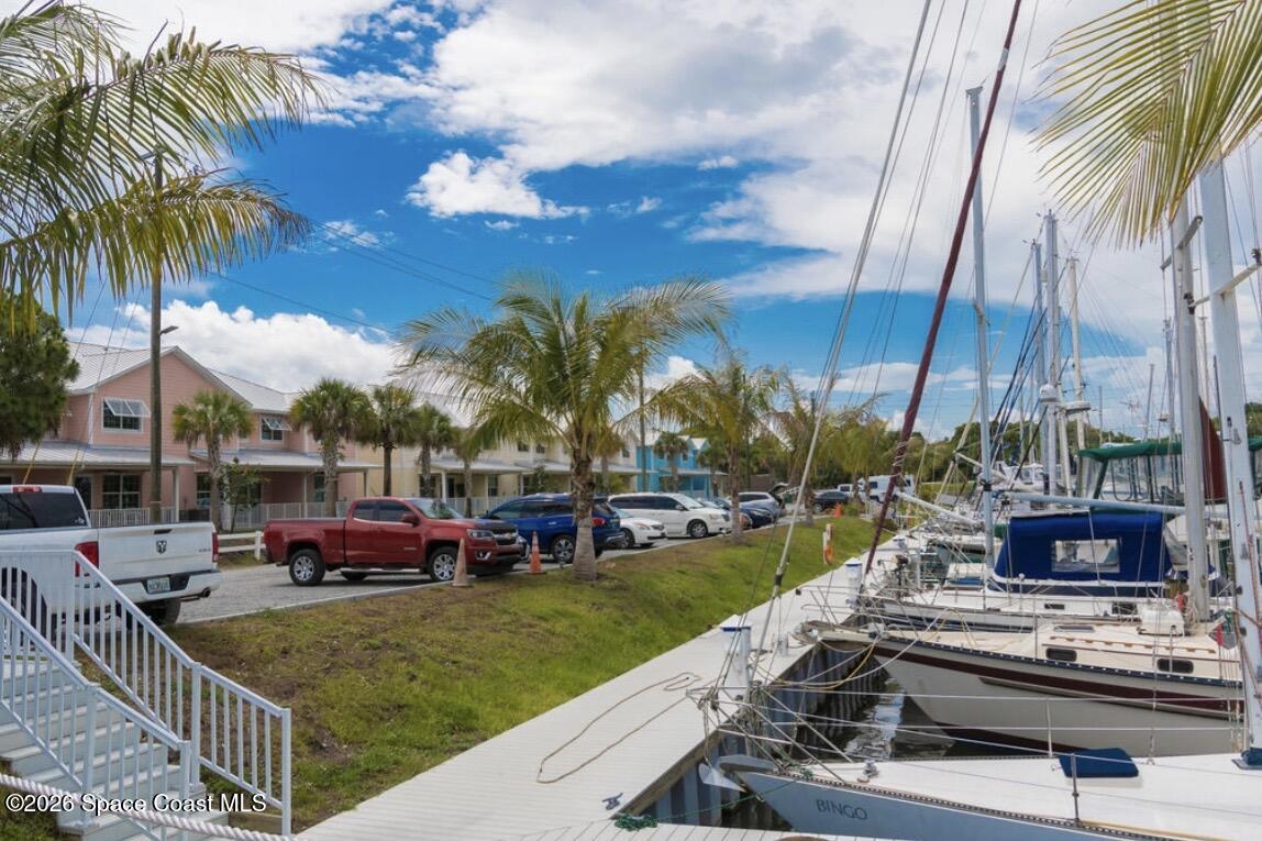 2709 Cutlass Point Lane, Unit 102 Merritt Island, FL 32953 - Photo 33 of 37 a view of outdoor space with garden and patio