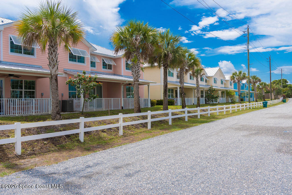2709 Cutlass Point Lane, Unit 102 Merritt Island, FL 32953 - Photo 34 of 37 a view of a house with a swimming pool