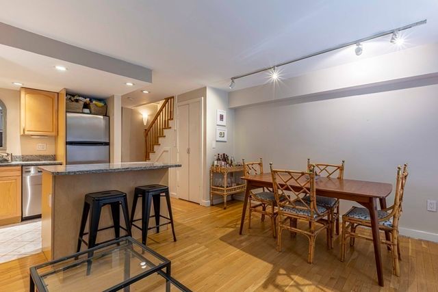 a view of a dining room with furniture