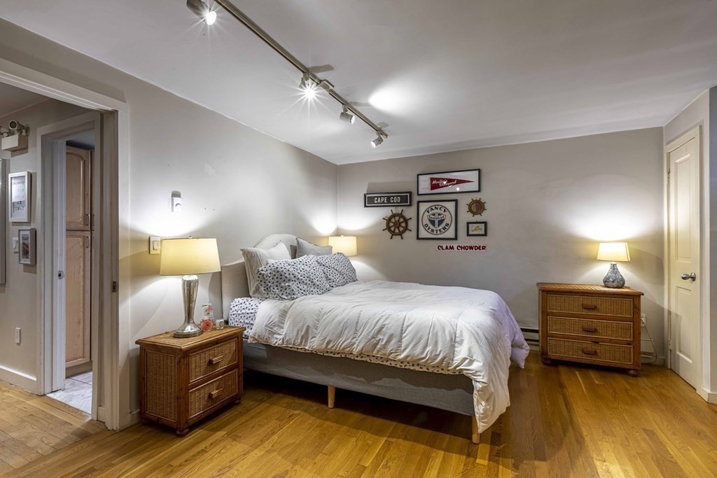 54 Appleton Street, Unit 1 Boston, MA 02116 - Photo 18 of 28 a bedroom with a bed and lamp