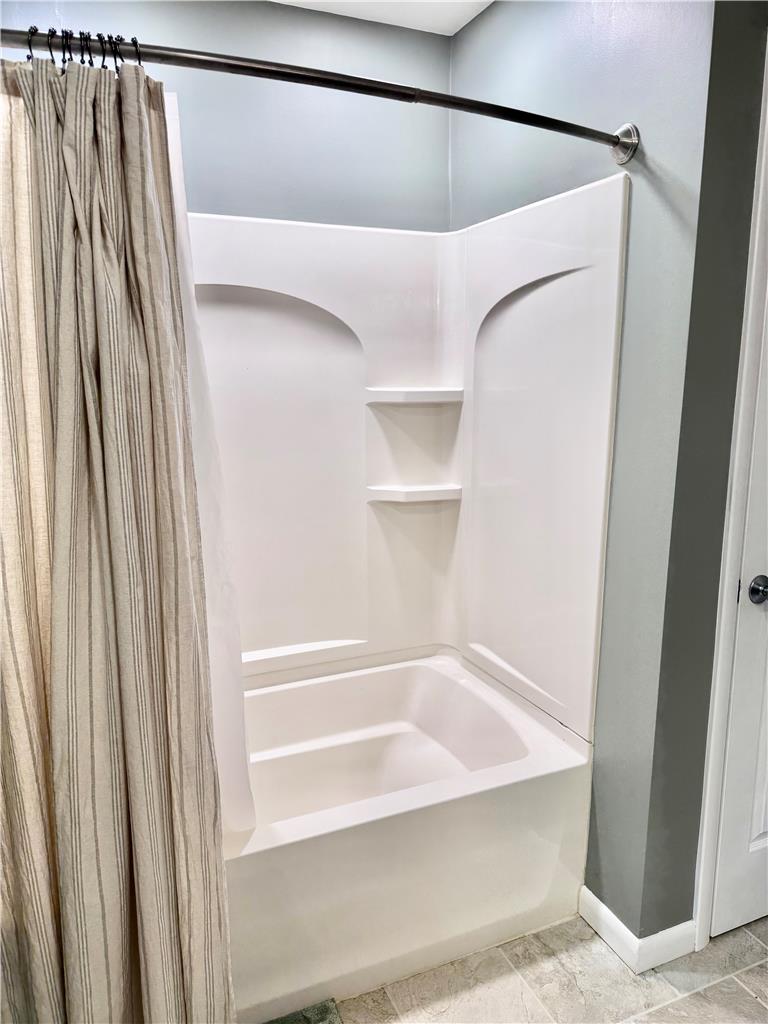 5334 Egypt Road Laurys Station, PA 18059 - Photo 21 of 55 A well-maintained bathroom offering a combination bathtub and shower.
