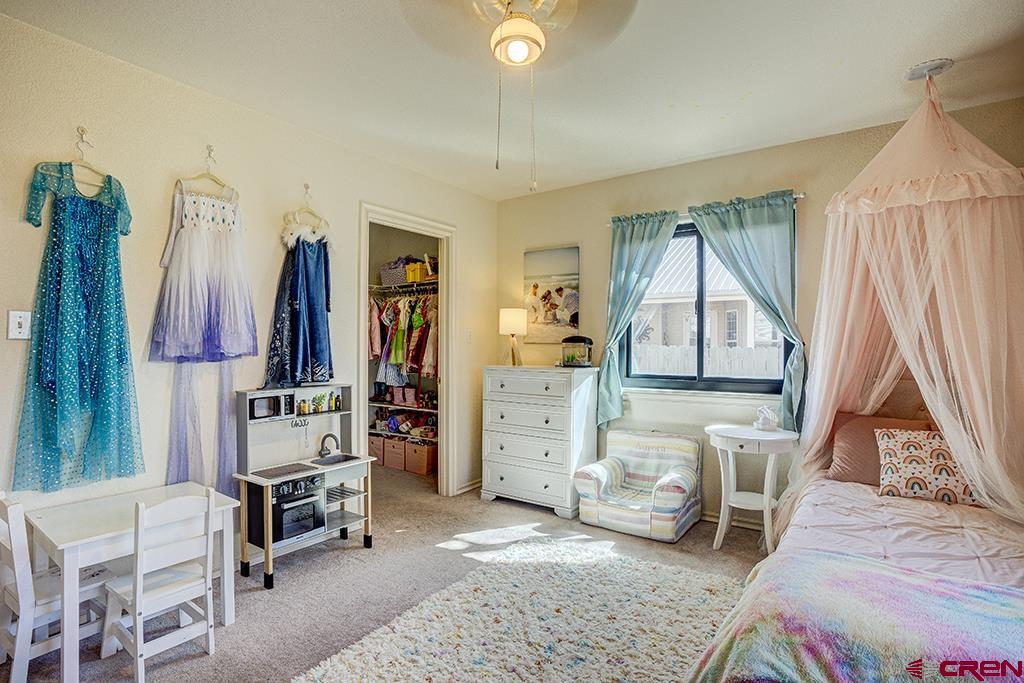 407 Colorado Street Cortez, CO 81321 - Photo 24 of 35 a living room with furniture and a window