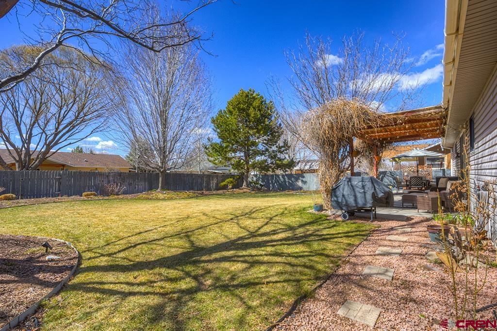 407 Colorado Street Cortez, CO 81321 - Photo 27 of 35 a view of a backyard of the house