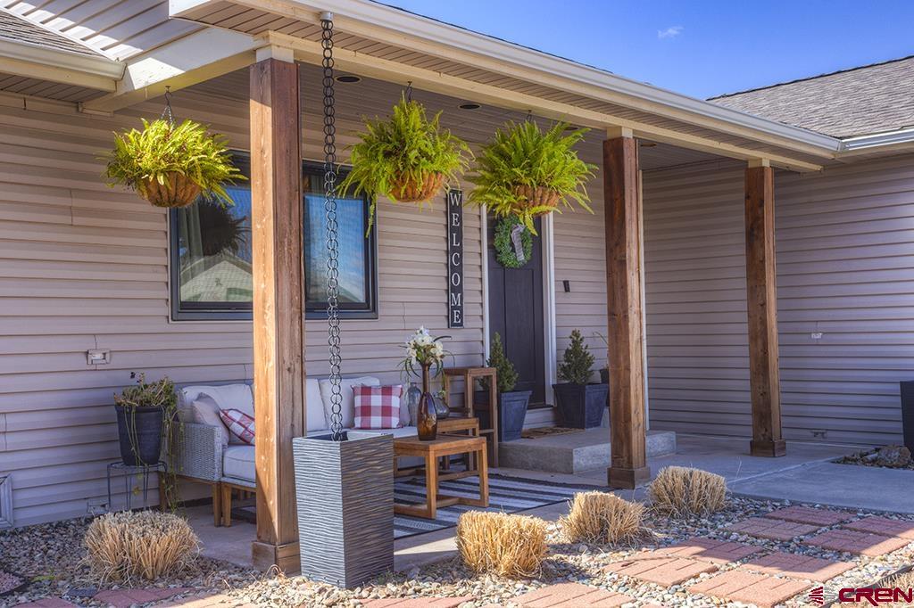 407 Colorado Street Cortez, CO 81321 - Photo 4 of 35 a view of a entryway door of the house