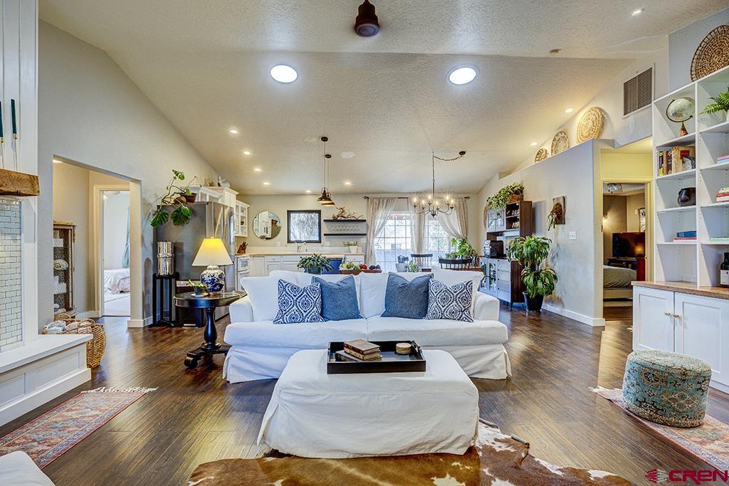 407 Colorado Street Cortez, CO 81321 - Photo 9 of 35 a living room with furniture and wooden floor