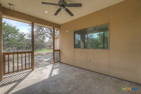 a view of a room with a large window