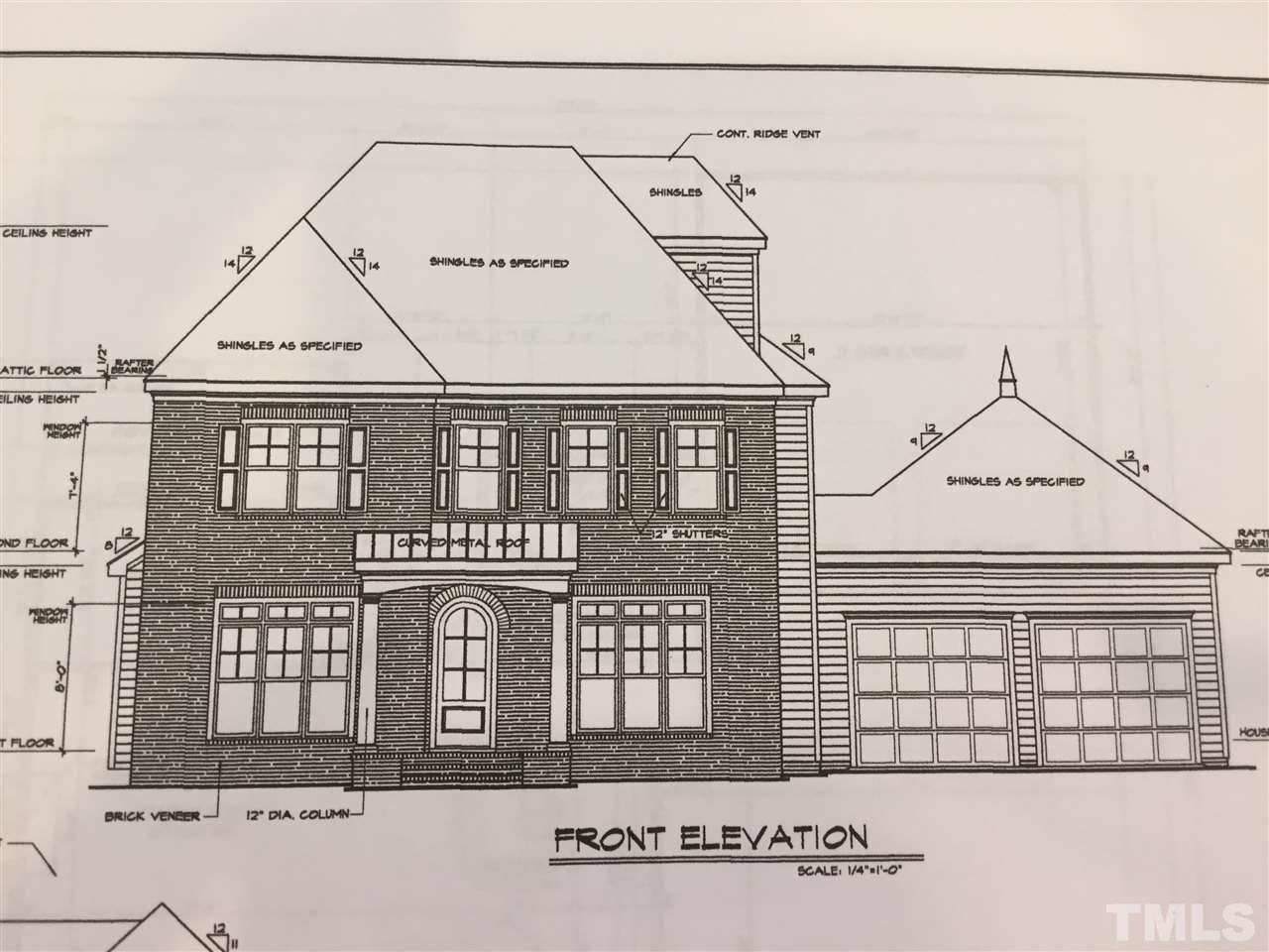 5220 Woodall Way, Unit 14 Raleigh, NC 27613 - Photo 2 of 4 a view of a brick house with large windows