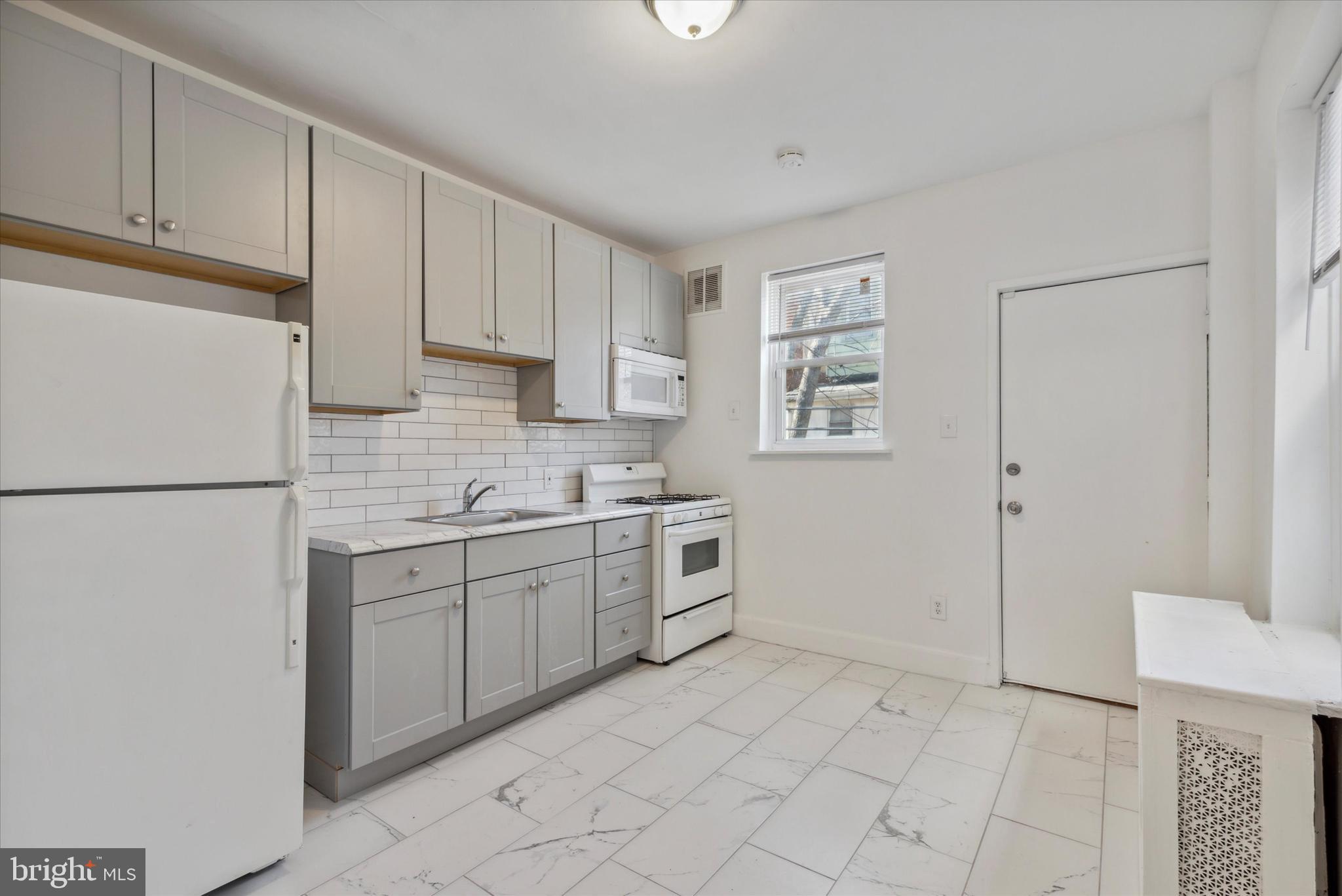 6329 Reedland Street Philadelphia, PA 19142 - Photo 5 of 14 Renovated Kitchen