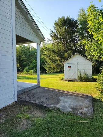 a view of a house with a swimming pool