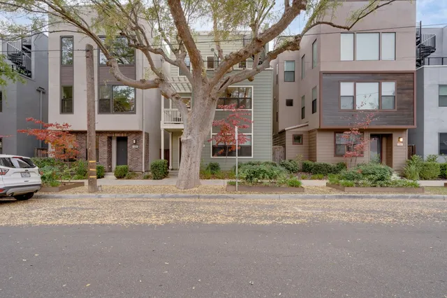 a front view of a building with a street