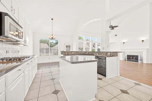 a white bath tub with a shower