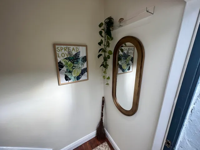 a close view of a utility room with dryer and washer