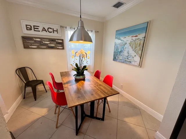 a view of a dining room with furniture