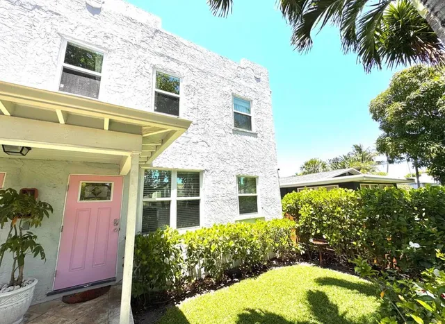 a view of a balcony with plants