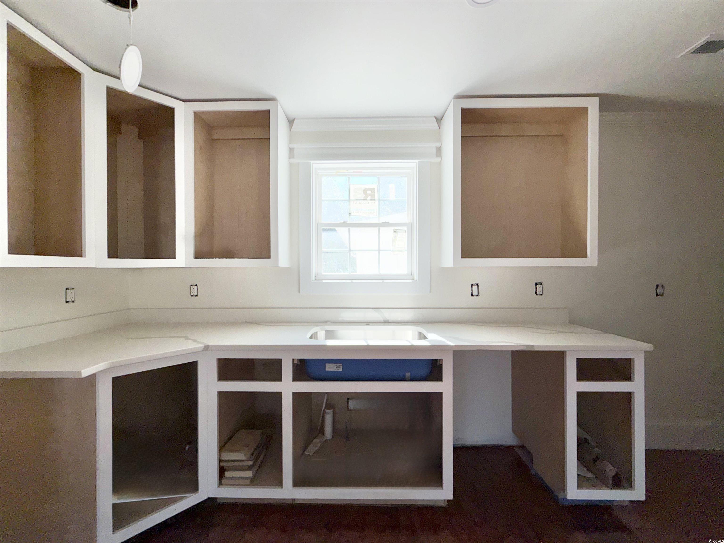 1003 Winding Road Conway, SC 29526 - Photo 8 of 32 Kitchen featuring pendant lighting and dark wood-style floors