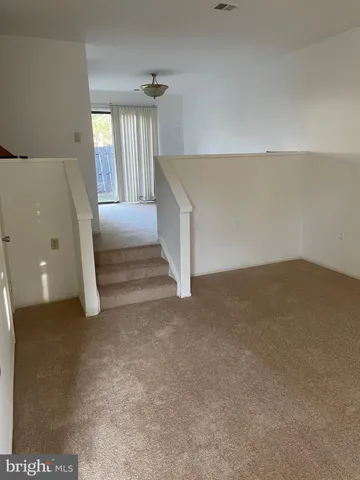 a view of a hallway with entryway