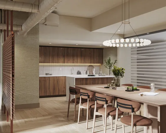 a kitchen with a table and chairs in it