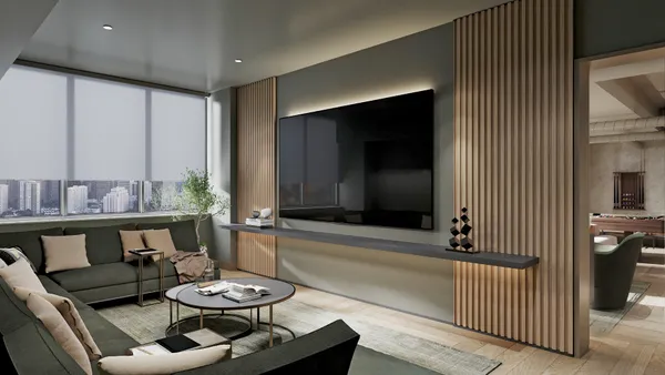 a living room with furniture and a flat screen tv