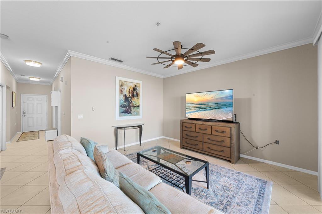 8570 Kingbird Loop, Unit 547 Estero, FL 33967 - Photo 11 of 50 a bedroom with furniture and a window