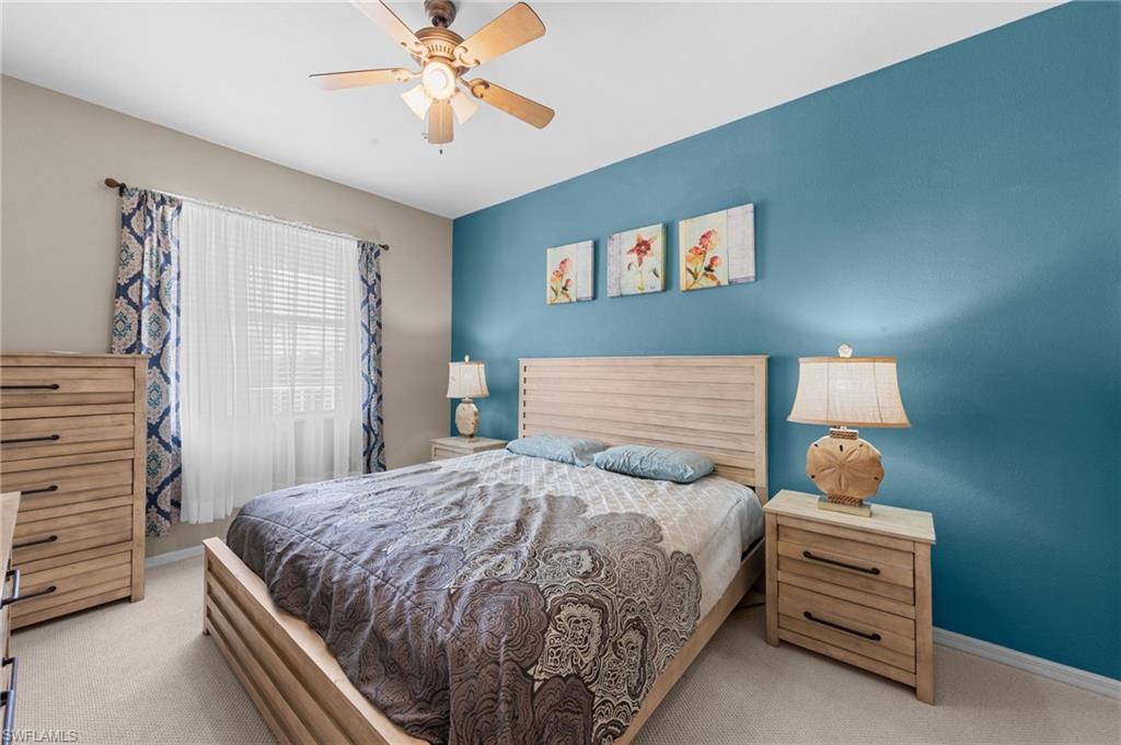8570 Kingbird Loop, Unit 547 Estero, FL 33967 - Photo 14 of 50 a bedroom with a bed and a window