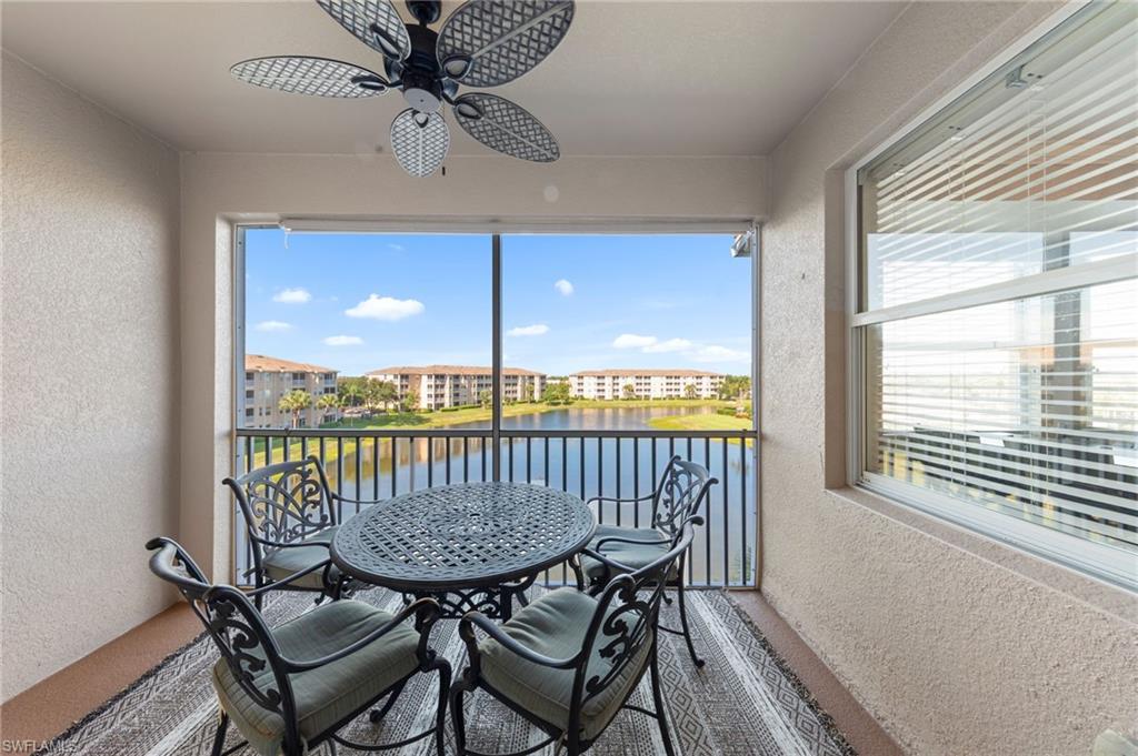 8570 Kingbird Loop, Unit 547 Estero, FL 33967 - Photo 21 of 50 a view of a balcony with furniture