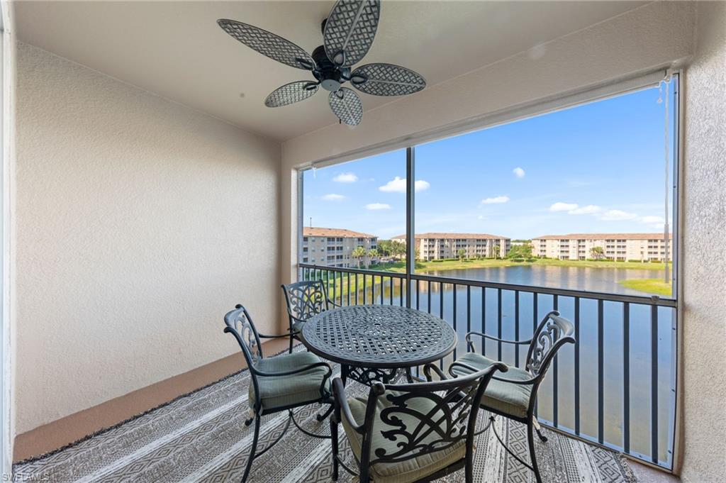 8570 Kingbird Loop, Unit 547 Estero, FL 33967 - Photo 22 of 50 a view of a balcony with furniture