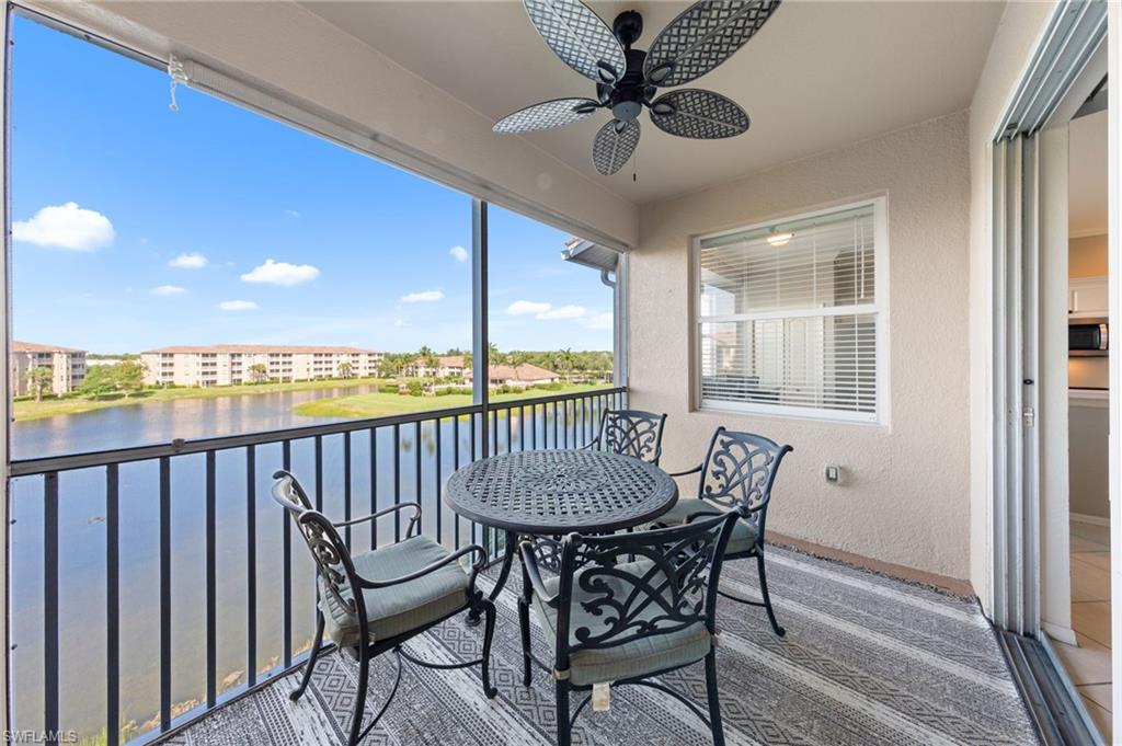 8570 Kingbird Loop, Unit 547 Estero, FL 33967 - Photo 23 of 50 a view of a dining room with furniture window and wooden floor