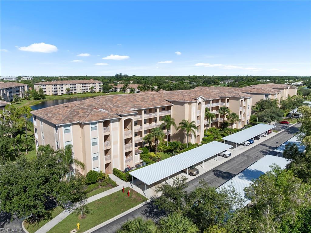 8570 Kingbird Loop, Unit 547 Estero, FL 33967 - Photo 26 of 50 an aerial view of multiple house