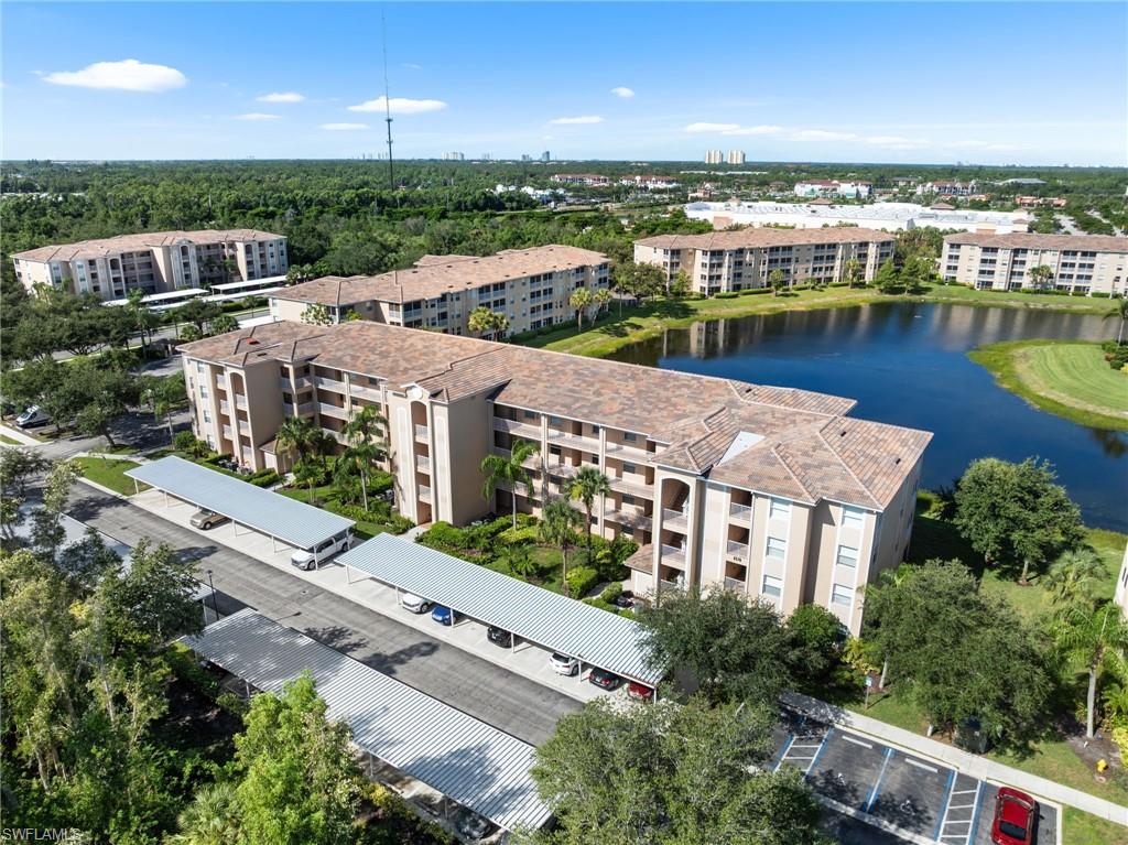 8570 Kingbird Loop, Unit 547 Estero, FL 33967 - Photo 28 of 50 an aerial view of a house with a lake view